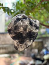 Load image into Gallery viewer, Cosmic Blackout Reverse Tie Dye Bucket Hat
